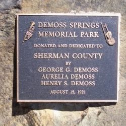 Photo of dedication plaque for DeMoss Springs Park