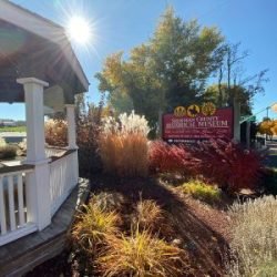 Photo of the visitor information kiosk and Sherman County HIstorical Museum signage.